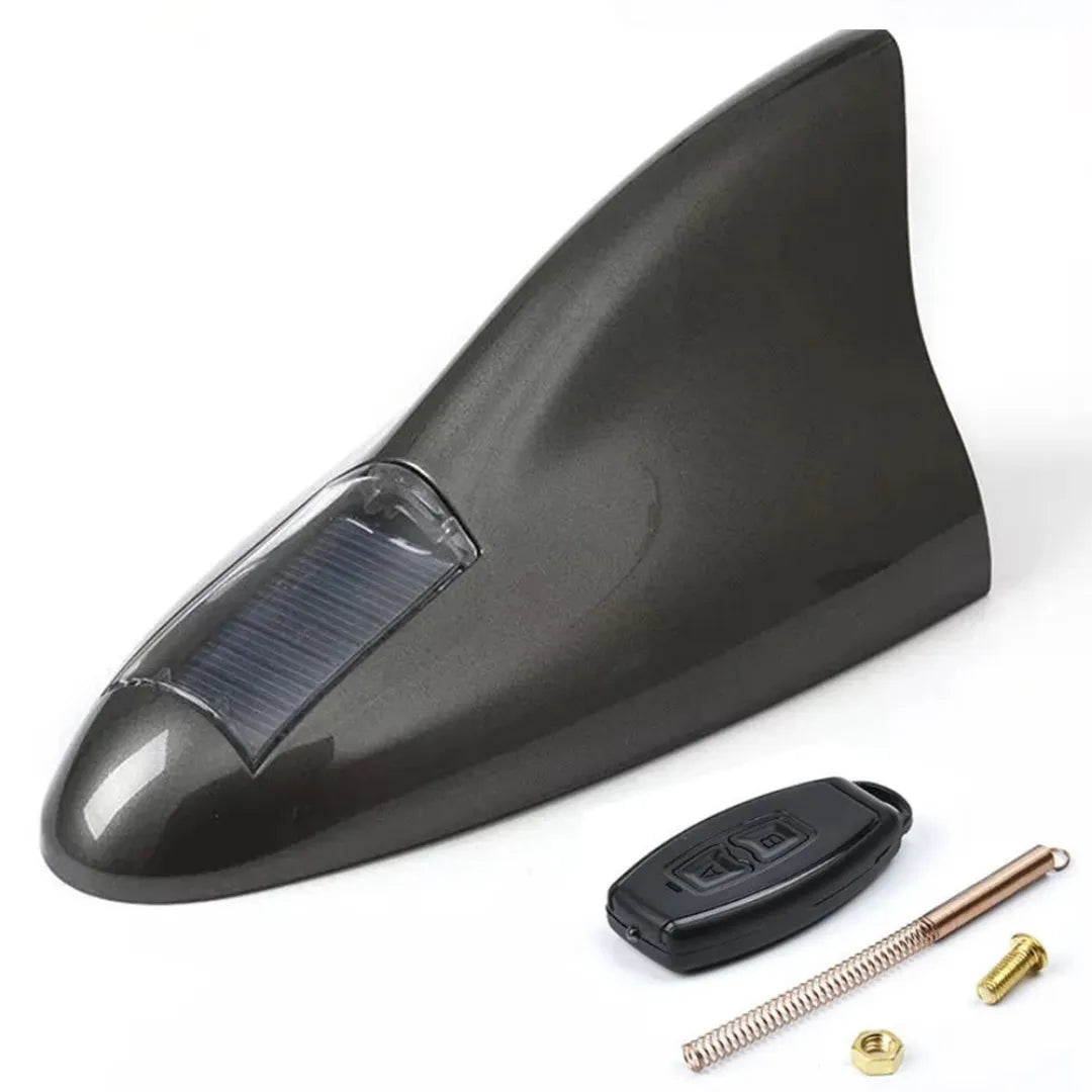 imagem mostra uma antena de tubarão para carro na cor cinza 